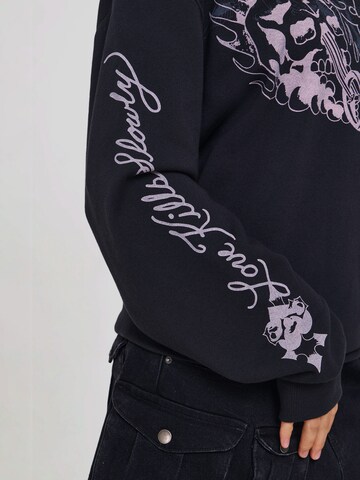 juoda Ed Hardy Megztinis: šonas