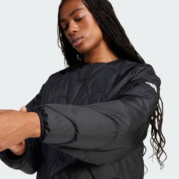 ADIDAS SPORTSWEAR Спортивная куртка 'Nuganic Insulation' в Черный