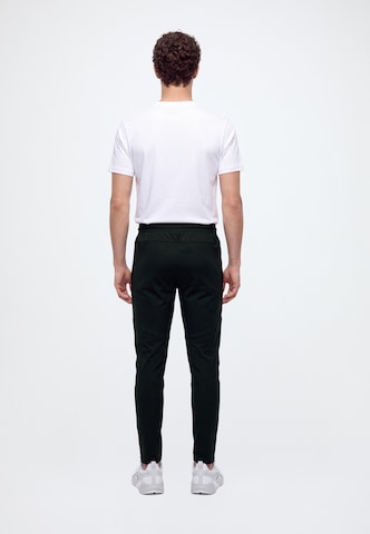 UNDER ARMOUR - Tapered Pantalón deportivo en negro