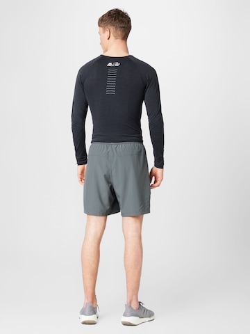 NIKE Обычный Спортивные штаны 'Form' в Серый