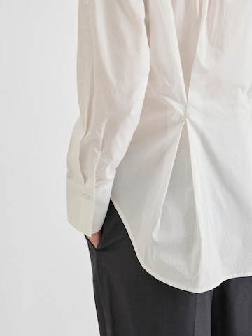 ROUGE EDIT - Blusa en blanco
