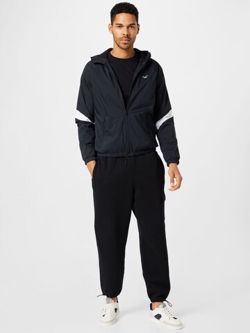 HOLLISTER Loose fit Trousers in Black