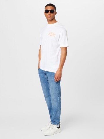 Calvin Klein Jeans Tričko – bílá