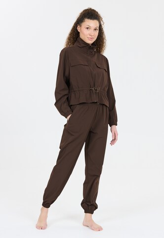 Athlecia Tapered Sporthose 'Hero' in Braun