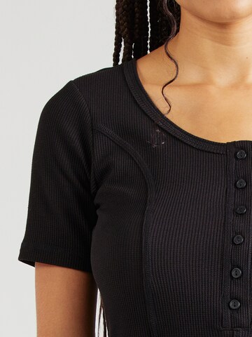 Maglietta di Champion Authentic Athletic Apparel in nero