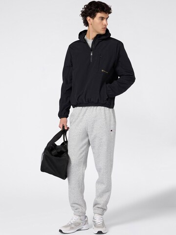 Champion Authentic Athletic Apparel Jacke in Schwarz