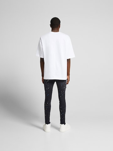 Skinny Jeans de la Bershka pe negru