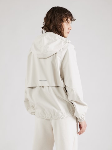 NIKE Športna jakna 'SWIFT' | srebrna barva