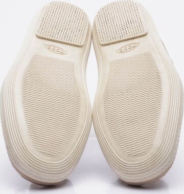 Tod's Flats & Loafers in 40 in White