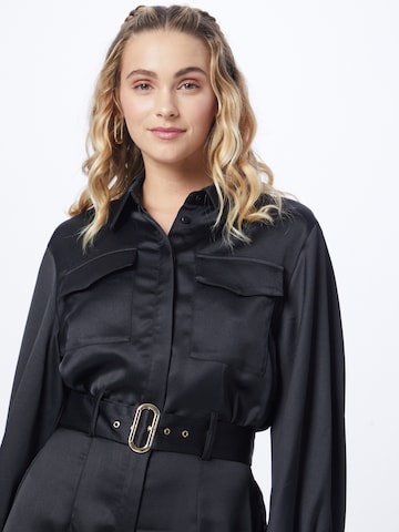 Tuta jumpsuit di River Island in nero