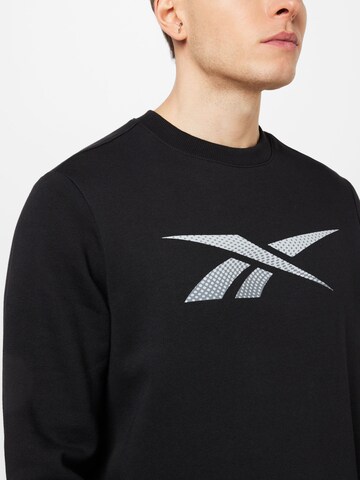 Reebok Sportsweatshirt in Zwart