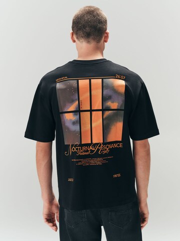 T-Shirt Next en noir : devant