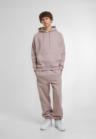 Tapered Pantaloni di Urban Classics in rosa