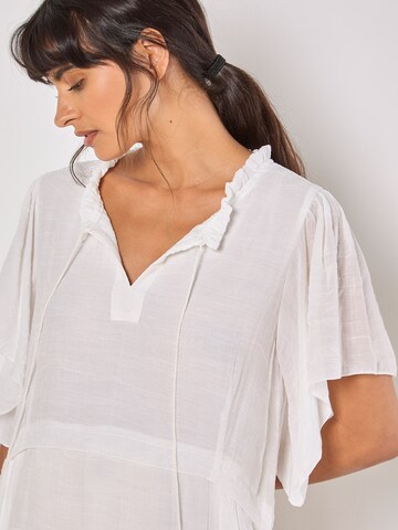 Chemisier ' ' Apricot en blanc