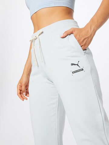 Effilé Pantalon de sport 'Better' PUMA en gris