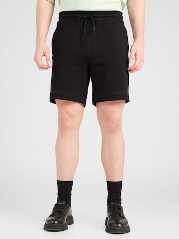 Regular Pantaloni 'Sewalk' de la BOSS Orange pe negru: față