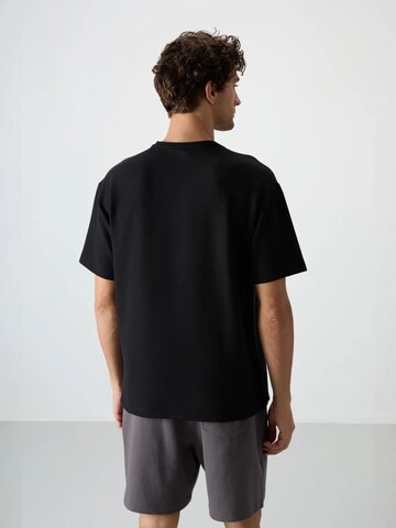 Tommy Life T-Shirts in Schwarz