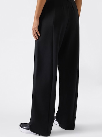 Wide leg Pantaloni de la Champion Authentic Athletic Apparel pe negru