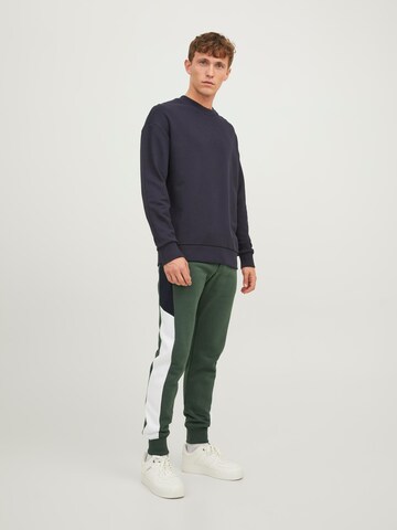 žalia JACK & JONES Siaurėjantis Kelnės 'Will Reid'