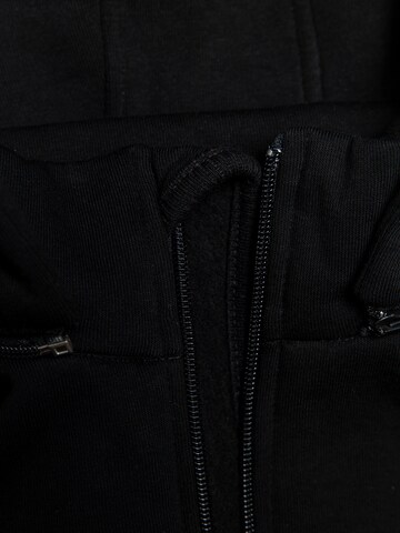 MANUL Overall 'Panther by MANUL – Smart BackZip' in Schwarz
