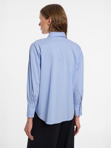 Haut 'Engilis' Ana Alcazar en bleu