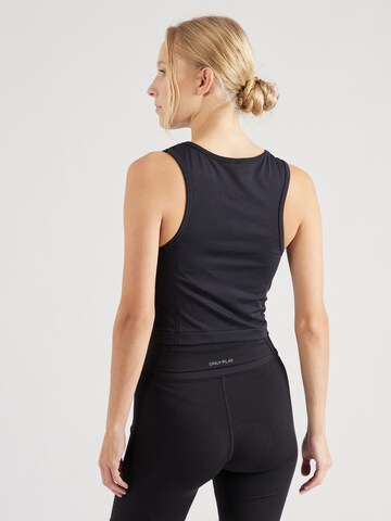 UNDER ARMOUR Sporttop in Schwarz | ABOUT YOU