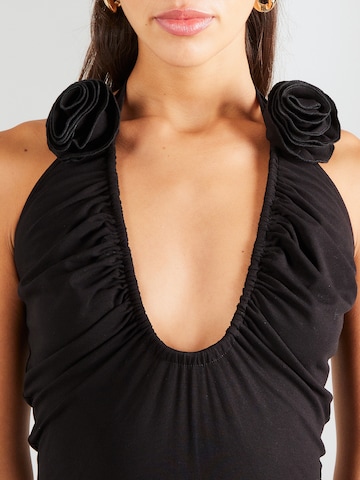 Rochie 'Claude' de la millane pe negru