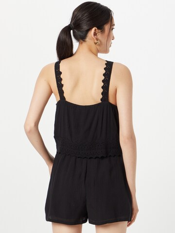 Tuta jumpsuit 'Gisa' di ABOUT YOU in nero