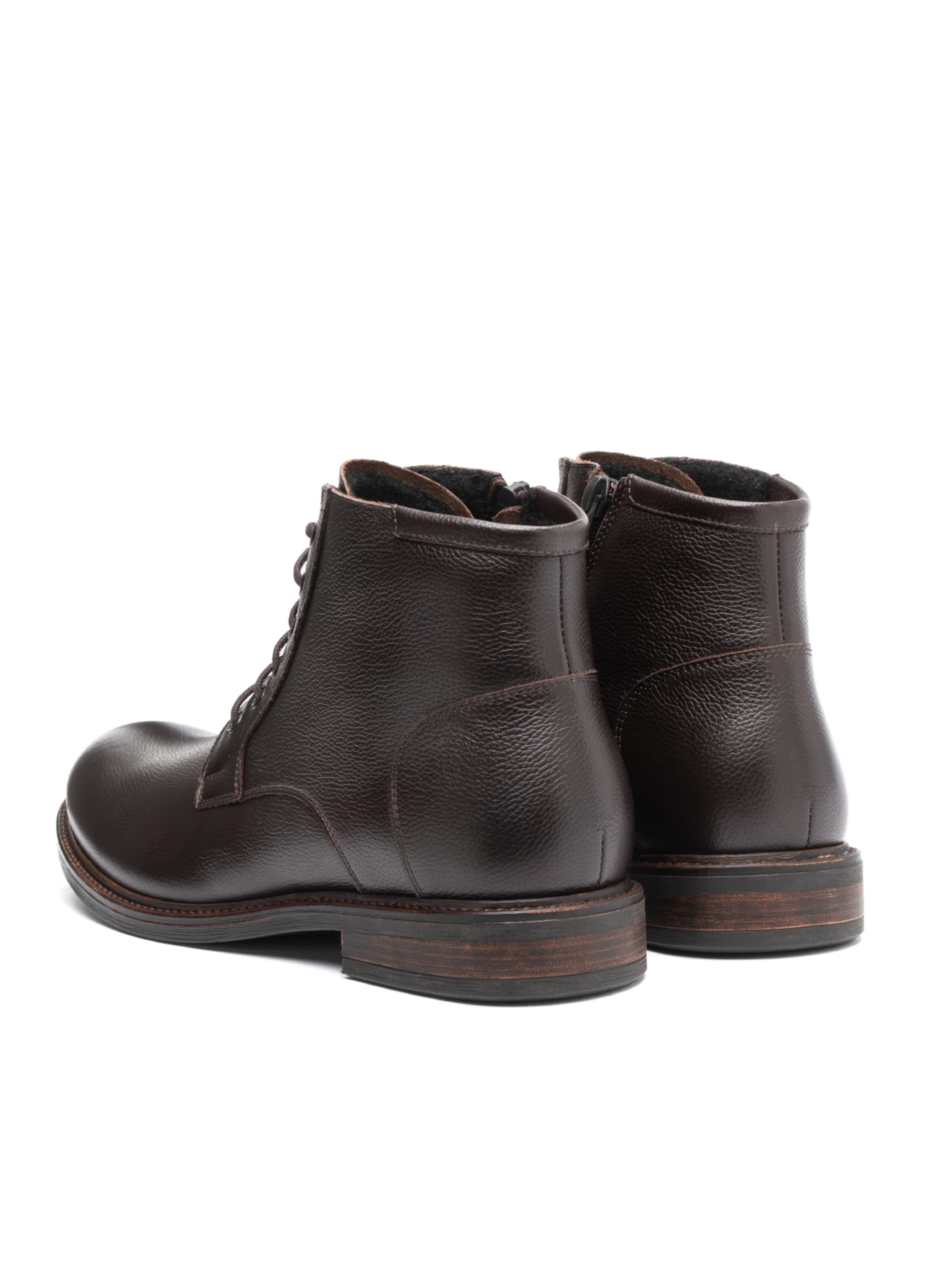 Boots stringati di RYŁKO in marrone