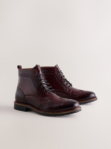 Boots stringati di Next in rosso