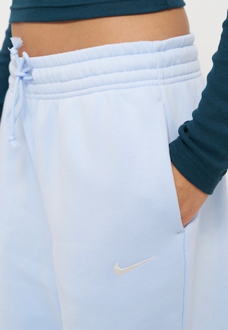 Nike Sportswear - Tapered Calças 'PHNX FLC' em azul