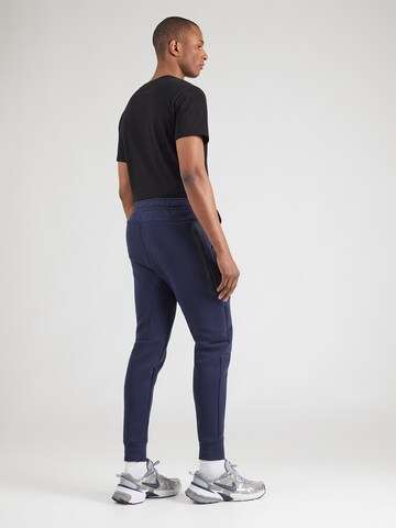 Nike Sportswear Конический (Tapered) Штаны 'TCH FLC' в Черный