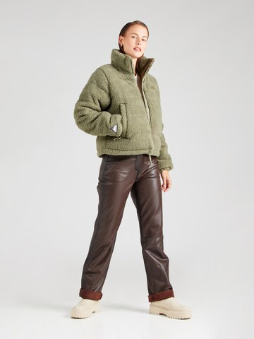 HELLY HANSEN Átmeneti dzseki - zöld