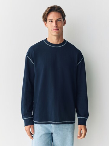 Next Póló - kék: elől