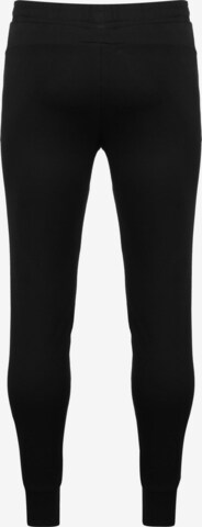 Effilé Pantalon de sport 'TeamGoal 23' PUMA en noir
