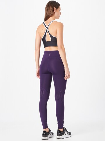 UNDER ARMOUR Skinny Športne hlače 'Fly Fast' | vijolična barva