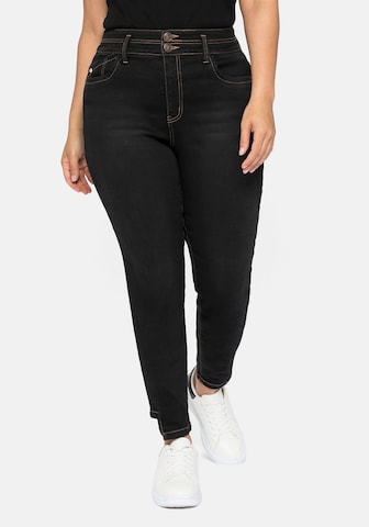 SHEEGO Skinny Jeans in Black: front