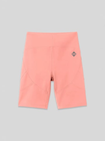 Tommy Life - Tapered Leggings 'Gamaschen' em laranja: frente
