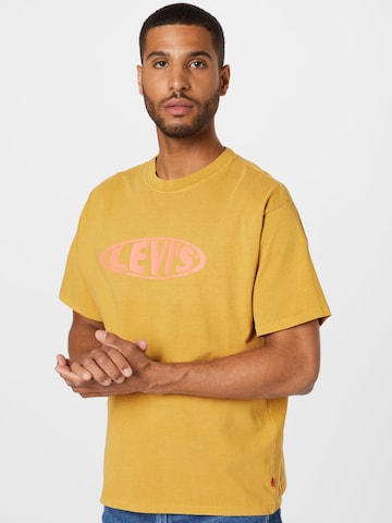 LEVI'S ® T-shirt 'Vintage Fit Graphic Tee' i gul: framsida