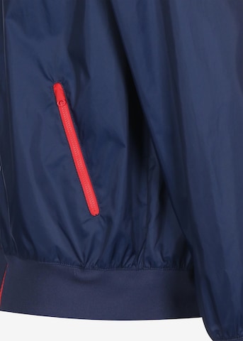 Nike Sportswear Välikausitakki 'Heritage Essentials' värissä sininen