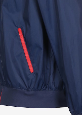 Nike Sportswear Between-season jacket 'Heritage Essentials' in Blue