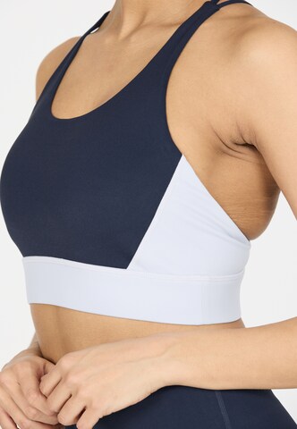 Athlecia Low Support Sport-BH 'Aspasia' in Blau