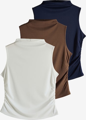 The Set Toppi värissä sininen: etupuoli