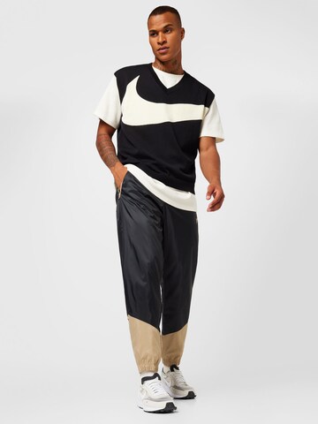 Nike Sportswear Tapered Παντελόνι σε μαύρο