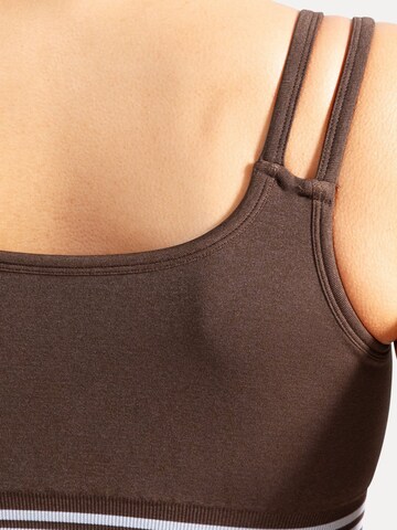 Smilodox Sporttop in Bruin