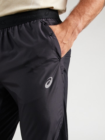 juoda ASICS Standartinis Sportinės kelnės 'ROAD'