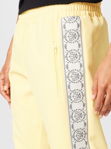 MOUTY Regular Trousers in Yellow