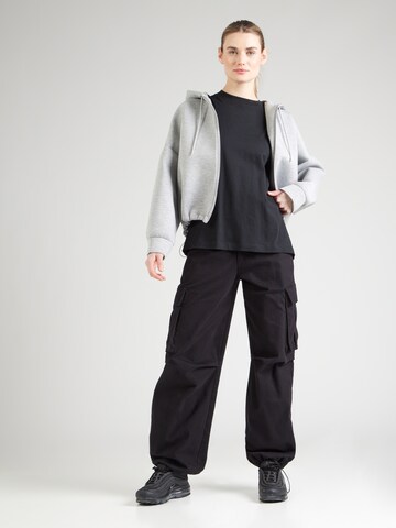Maglietta di Champion Authentic Athletic Apparel in nero