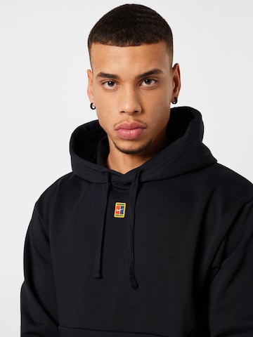 Sweat de sport NIKE en noir