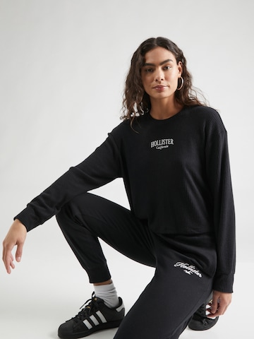 Tricou de la HOLLISTER pe negru: față